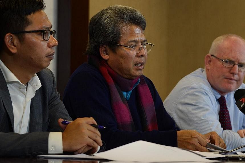 In this Feb 9, 2015 photo, Indonesian lawyers Todung Mulya Lubis (centre), Doly James (left) and Australian lawyer Julian McMahon (right) speak at a press conference in Jakarta. They are fighting to save two Australian prisoners, Andrew Chan and Myur