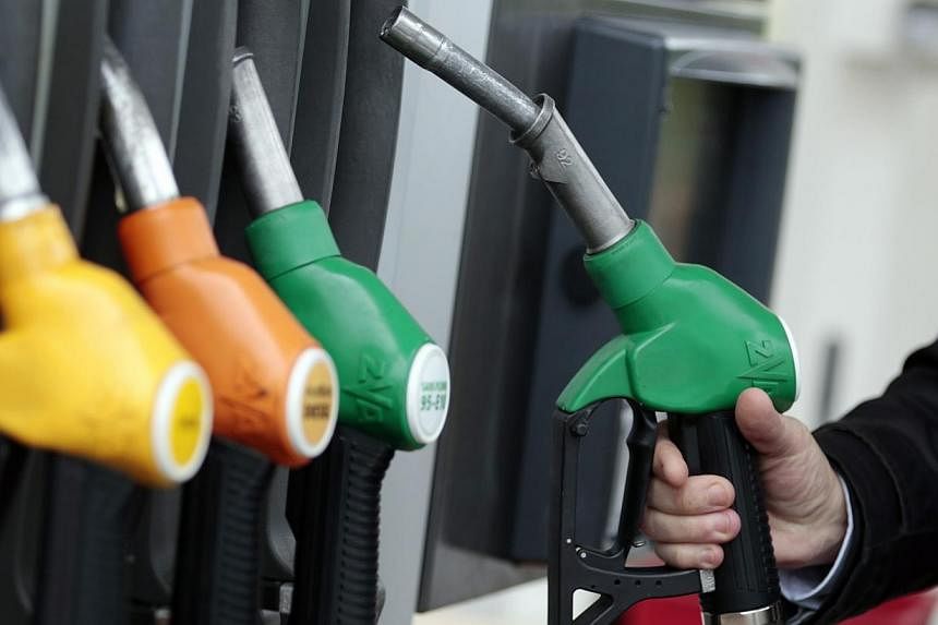 Any serious effort to lower greenhouse gas emissions is certainly going to raise prices on petrol or electricity. -- PHOTO: REUTERS