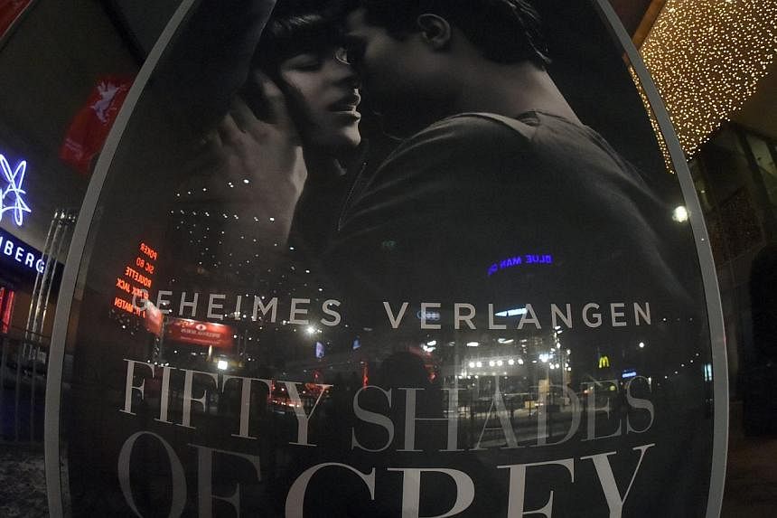 A view of a poster for the movie Fifty Shades Of Grey in Berlin, Germany, on Feb 4 2015. The long-anticipated movie version of the bestselling erotic novel, began its worldwide rollout on Wednesday, opening in theatres across France, Germany, Belgium