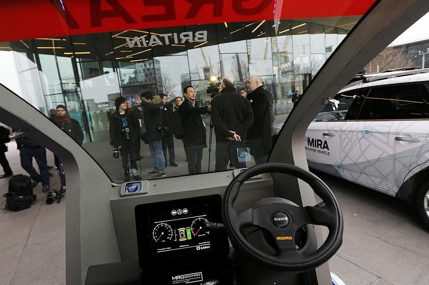 A prototype of a Lutz Pathfinder driverless vehicle is displayed to members of the media in Greenwich, east London, on Feb 11, 2015. &nbsp;Britain gave the green light on Wednesday for the testing of futuristic driverless cars on public roads in a mu