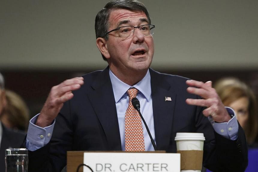 Ashton Carter (above) was confirmed as US secretary of defence on Thursday, taking on the job of supervising the war against Islamic State in Iraq and Syria militants in the final two years of Barack Obama's presidency. -- PHOTO: REUTERS