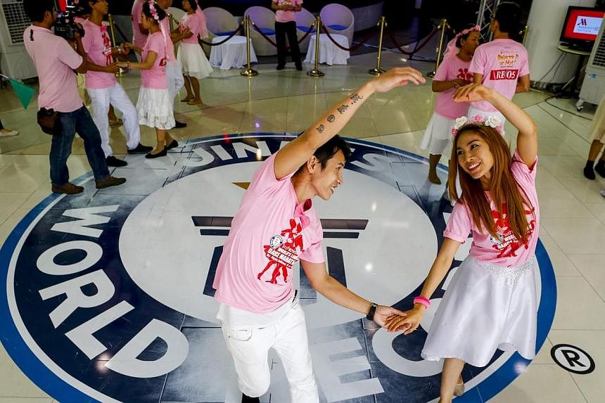 Couples dancing during a Guinness World record attempt for the Ripley's Believe It or Not! world's longest dance marathon in Pattaya, Thailand, on&nbsp;Feb 14,&nbsp;2015. -- PHOTO: EPA