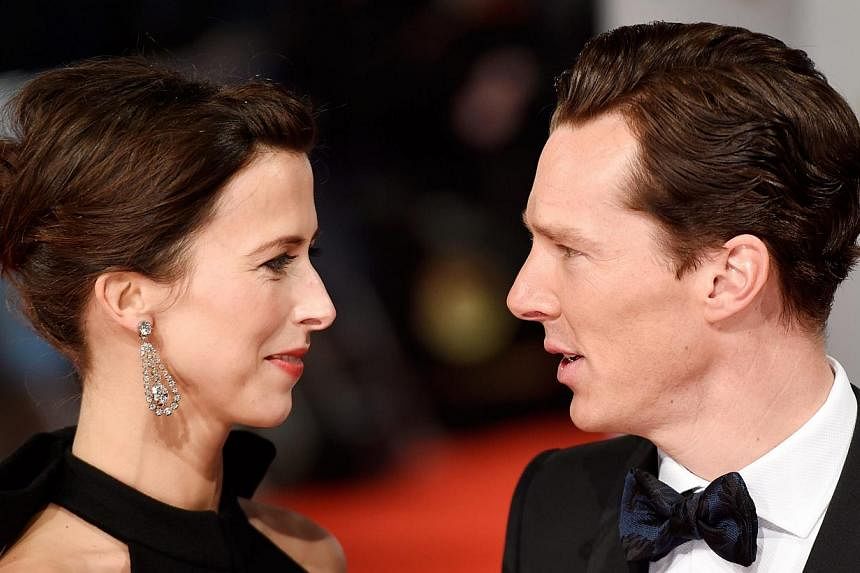 British actor Benedict Cumberbatch (right) and his fiancee Sophie Hunter arrive on the red carpet for the 2015 British Academy Film Awards ceremony at The Royal Opera House in London, Britain, on Feb 8,&nbsp;2015. -- PHOTO: EPA