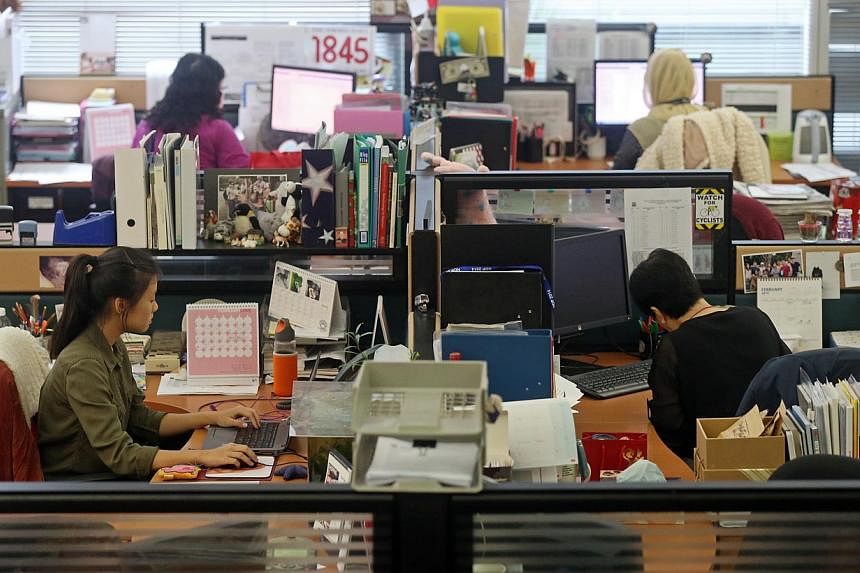 Harvard professor Rosabeth Moss Kanter observed that women do the lion's share of "office housework", the administrative tasks that help, but don't pay off. -- ST PHOTO: SEAH KWANG PENG