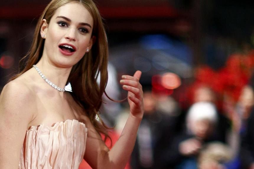Actress Lily James arrives for the screening of the movie Cinderella at the 65th Berlinale International Film Festival in Berlin Feb 13, 2015. -- PHOTO: REUTERS