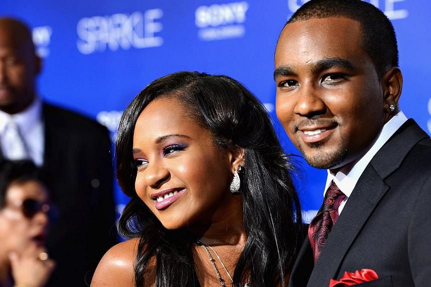 Nick Gordon, who calls himself the husband of Bobbi Kristina Brown (both pictured above), cannot visit her at the hospital where she is being treated after having been found face down and unresponsive in a bathtub last month, Brown's cousin told a lo