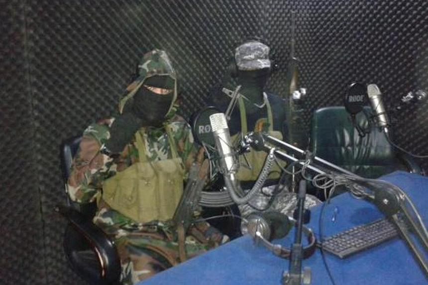 A photo from Twitter said to show ISIS militants in control of a radio station in Sirte.&nbsp;Gunmen claiming to be members of the Islamic State in Iraq and Syria militant group have seized control of a state-run radio station in Libya's coastal city