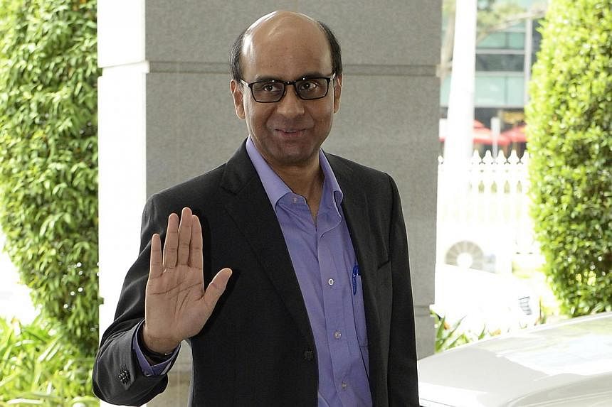 Finance Minister Tharman Shanmugaratnam arriving at Parliament to deliver the Budget speech in February 2014. -- PHOTO: ST FILE