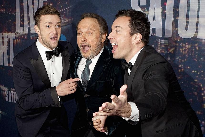 Singer Justin Timberlake (left), actor Billy Crystal and TV host Jimmy Fallon (right) arrive for the 40th Anniversary Saturday Night Live (SNL) broadcast in the Manhattan borough of New York on Feb 15, 2015.&nbsp;-- PHOTO: REUTERS