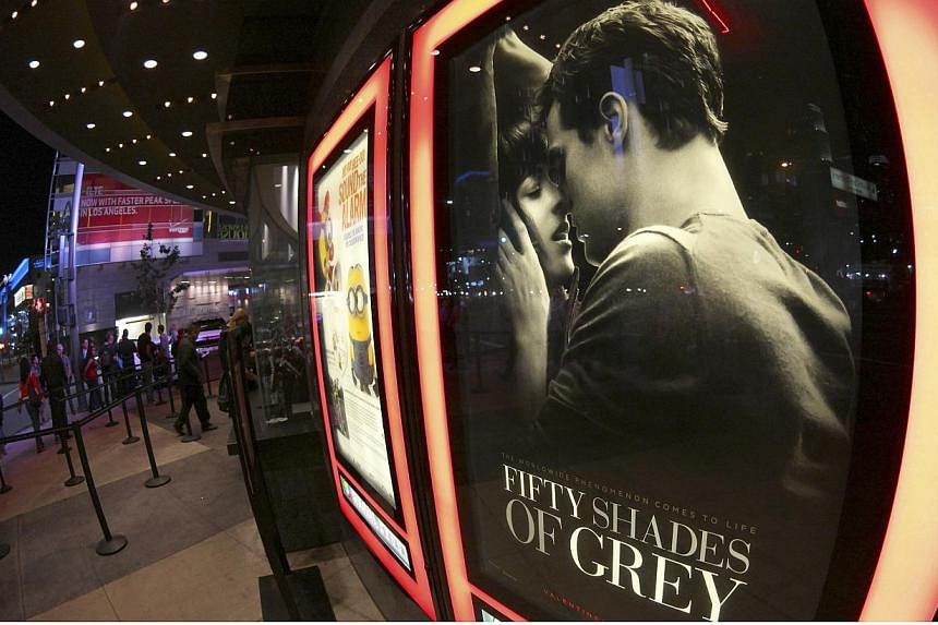 A film poster for Fifty Shades Of Grey is pictured at Regal Theater in Los Angeles, California on Feb 12, 2015.&nbsp;-- PHOTO: REUTERS