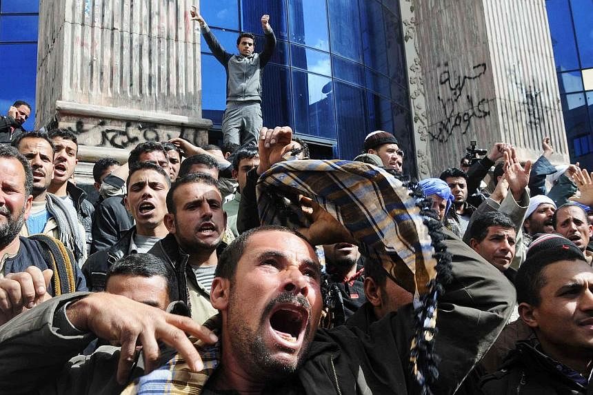 Egyptians protest what they characterise as Government inaction in reaction to the kidnapping of Copts in Libya, Cairo, Egypt on Feb 13, 2015.&nbsp;The United Arab Emirates expressed backing Monday for a strong Egyptian response to video released by 