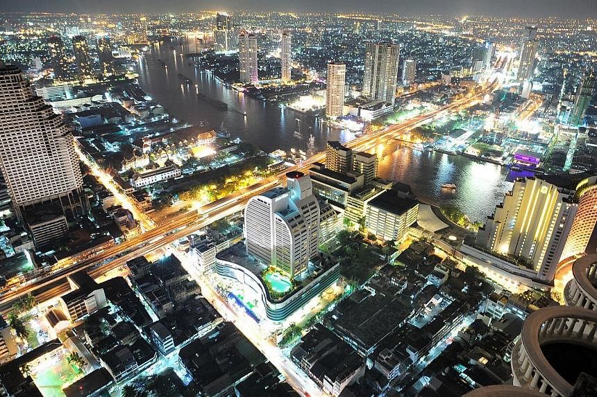 Night view of Bangkok, Thailand. The country's economy grew less than expected in October-December and had full-year 2014 growth of only 0.7 per cent, as exports and consumption remained weak long after a May coup aimed at helping to spur recovery. -
