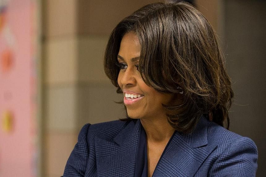US First Lady Michelle Obama is set to visit Japan in March for the first time since her husband Barack Obama entered the White House, local media reported Monday, Feb 16, 2015. -- PHOTO: AFP