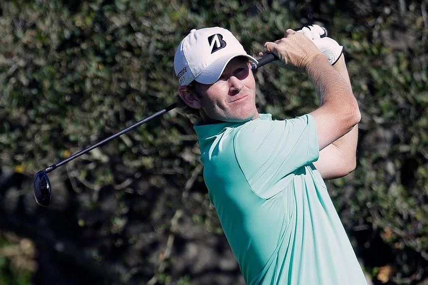 Brandt Snedeker watches his tee shot on the 16th hole during the final round of the AT&amp;T Pebble Beach National Pro-Am at the Pebble Beach Golf Links on Feb 15, 2015 in Pebble Beach, California. Snedeker had a&nbsp;flawless five-under par 67 for a