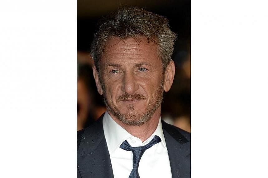 Actor Sean Penn arriving at the world premiere of The Gunman in London on Feb 16, 2015. -- PHOTO: EPA&nbsp;