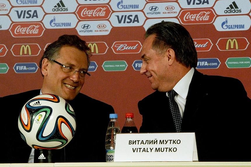 Fifa secretary-general Jerome Valcke (left) and Russian Sports Minister Vitaly Mutko give a press briefing on Feb 16, 2015 in St Petersburg.&nbsp;Russian Sports Minister Vitaly Mutko said during the conference that his organising committee faces no m
