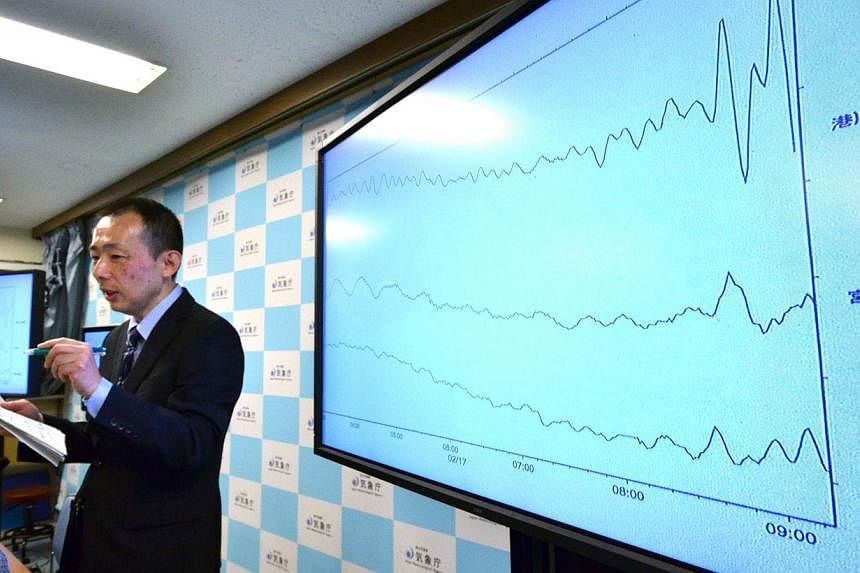 An earthquake expert from Japan's Meteorological Agency at a press conference at its headquarters in Tokyo on Feb 17, 2015. -- PHOTO: AFP