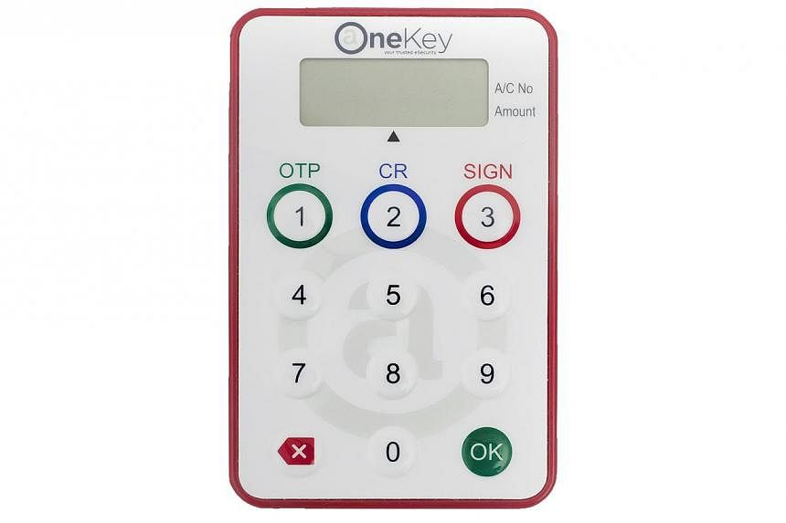 All Singapore citizens and permanent residents can soon register for the OneKey calculator-like token to secure their e-government transactions. -- PHOTO: ASSURITY&nbsp;