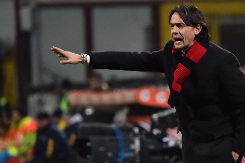 AC Milan's coach Filippo Inzaghi gestures during the Italian Serie A football match between AC Milan and Parma at San Siro Stadium in Milan on Feb 1, 2015. -- PHOTO: AFP