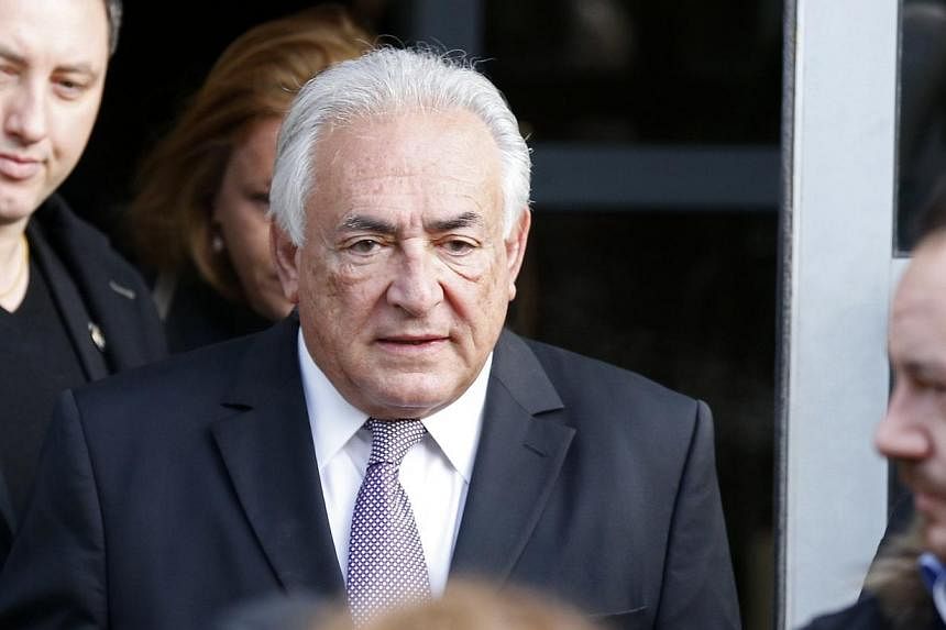 Former IMF head Dominique Strauss-Kahn leaves his hotel to attend the trial in the so-called Carlton Affair, in Lille, on Feb 18, 2015, where 14 people including Strauss-Kahn stand accused of sex offences including the alleged procuring of prostitute