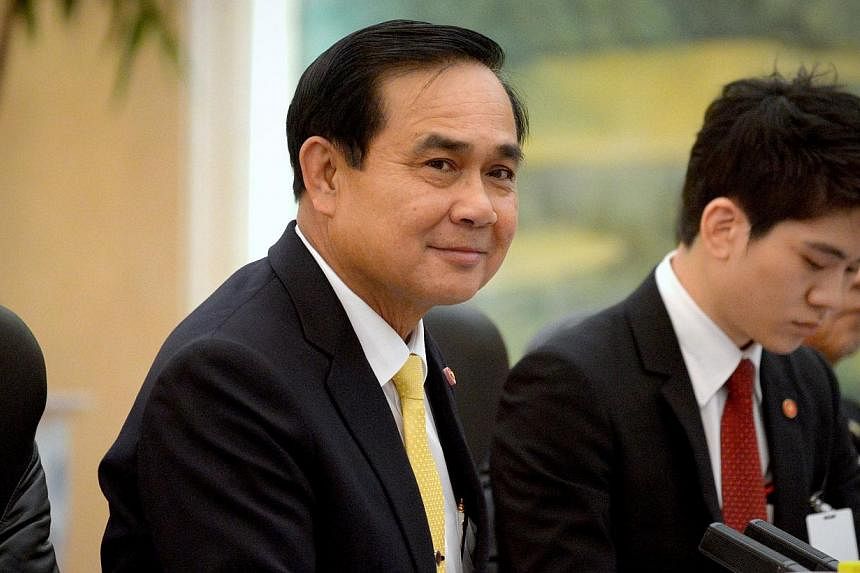 Thailand's Prime Minister Prayuth Chan-ocha (centre) in Beijing on Dec 23, 2014. Thailand's Cabinet has approved a 7.8 billion baht (S$300 million) budget to alleviate drought in the country and tackle "water emergencies", a government spokesman said