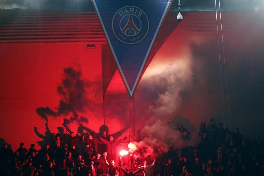Chelsea fans lighting flares during the UEFA Champions League round of 16 first leg against Paris Saint-Germain&nbsp;at the Parc des Princes Stadium, in Paris, France on Feb&nbsp;17,&nbsp;2015.&nbsp;-- PHOTO: EPA
