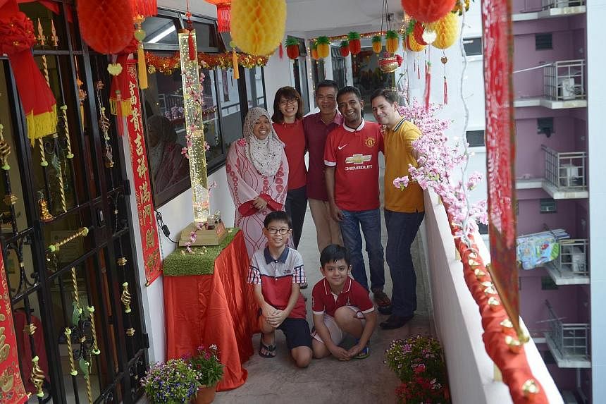 Reliving the kampung spirit': Neighbours put up CNY decorations