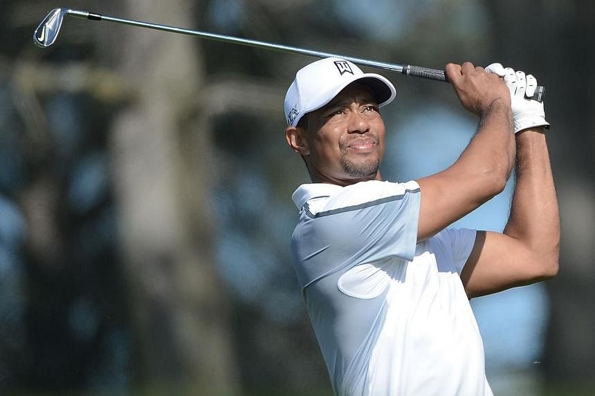 Former world number one Tiger Woods, who has vowed not to return to competition until his deteriorating game improves, won't play next week in the PGA Tour's Honda Classic. -- PHOTO: AFP&nbsp;