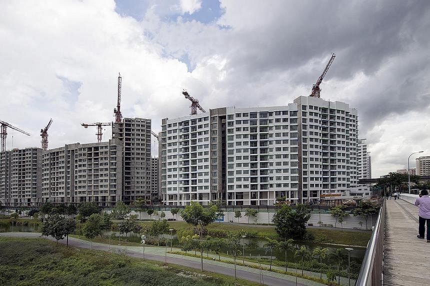 Flats being constructed in Punggol on Aug 10, 2014. -- PHOTO: BLOOMBERG