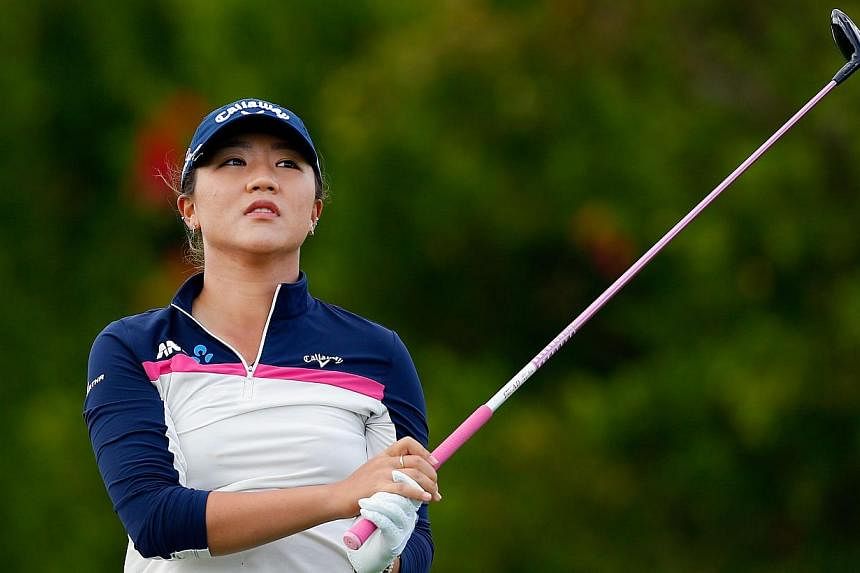 Lydia Ko of New Zealand hits a tee shot on the eighth hole during round two of the Pure Silk Bahamas LPGA Classic at the Ocean Club course on Feb 6, 2015, in Paradise Island, Bahamas. Ko shot a second straight three-under par 70 on Friday to grab a s