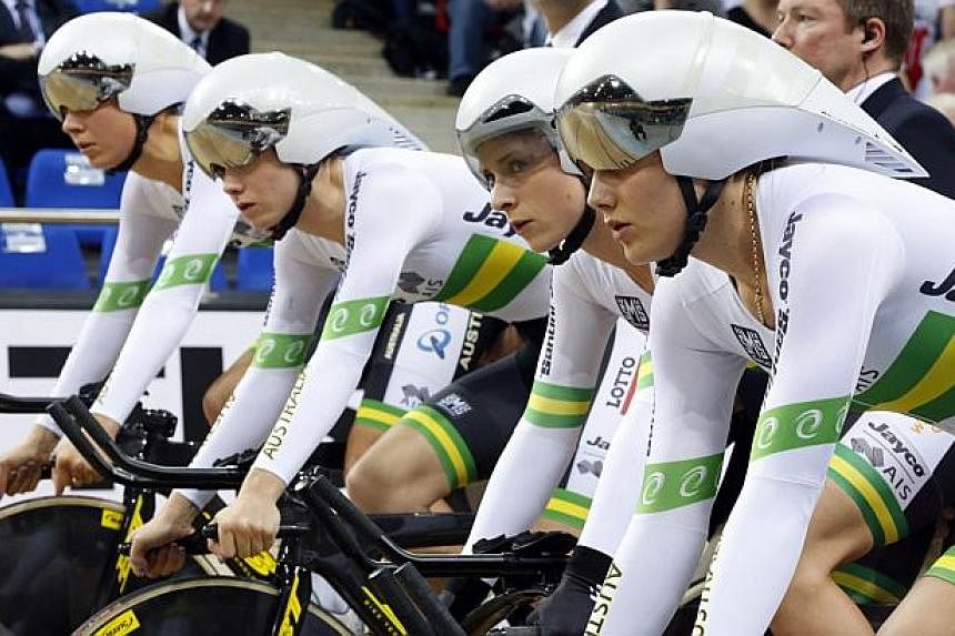 The Australian team, including Annette Edmondson, Ashlee Ankudinoff, Amy Cure and Melissa Hoskins, competes in the women's team pursuit first round race Feb 19, 2015. -- PHOTO: REUTERS