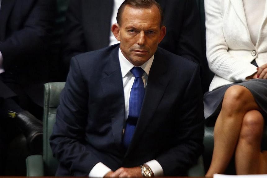 Australian Prime Minister Tony Abbott was on Tuesday accused of "scapegoating" an entire community and inciting "ill-feeling" after telling Muslim leaders to do more to combat extremism. -- PHOTO: REUTERS