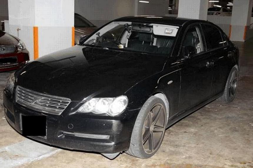 A car driven by a 34-year-old suspected drug trafficker, who was arrested in a CNB operation at Geylang on Feb 23, 2015. -- PHOTO: CNB
