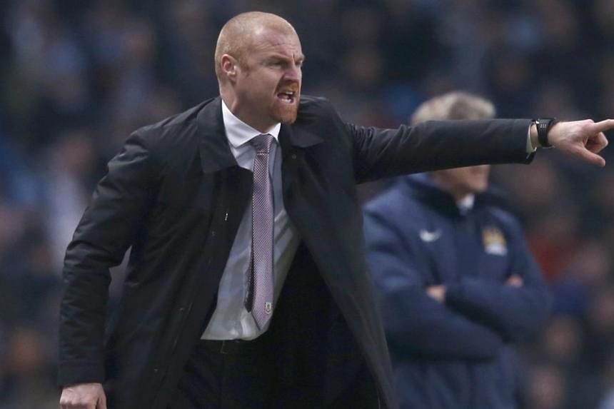 Burnley manager Sean Dyche reacts during their English Premier League soccer match against Manchester City at the Etihad Stadium in Manchester, northern England on Dec 28, 2014. -- PHOTO: REUTERS