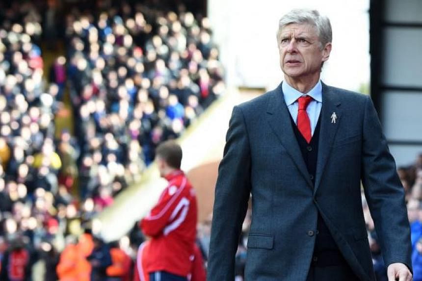 Arsenal manager Arsene Wenger prior to the English Premier League soccer match Crystal Palace v Arsenal at Selhurst Park in London, Britain, 21 Feb 2015. -- PHOTO: EPA