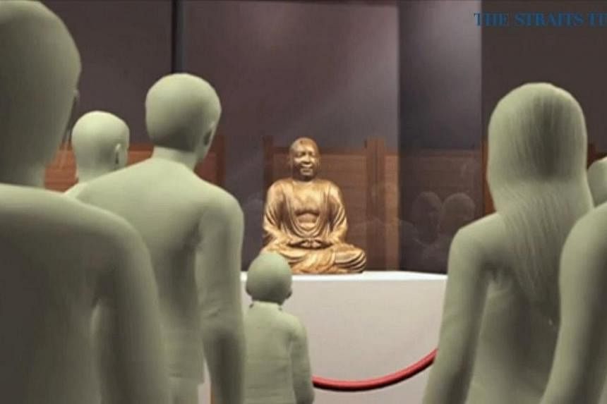 The Buddha statue, which was on display at the Drents Museum in the Dutch city of Assen, was analysed at the Meander Medical Centre in Amersfoort. -- PHOTO: VIDEO SCREENGRAB