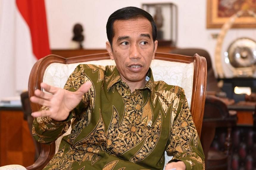 Indonesia's president Joko Widodo says the planned execution of 11 convicts on death row, most on drugs charges, would not be delayed, warning foreign countries not to intervene in the country's right to use capital punishment. -- PHOTO: BLOOMBERG&nb