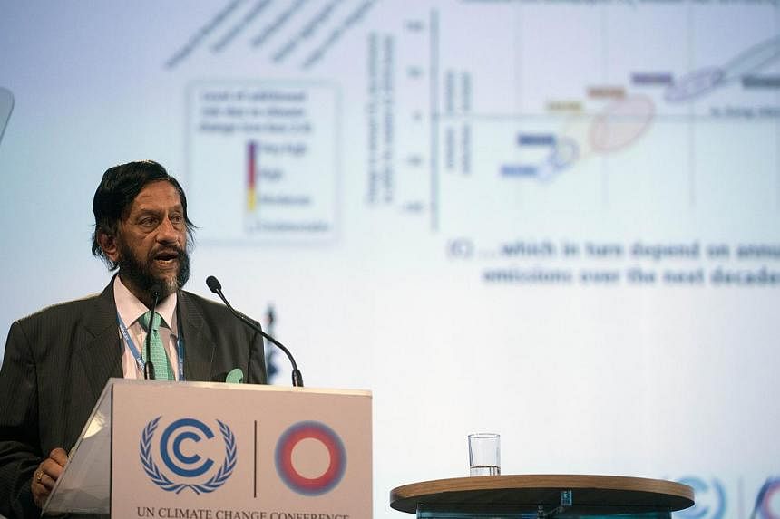 Rajendra Pachauri, head of the UN panel of climate scientists, speaks during a high level meeting at UN COP20 and CMP10 climate change conferences being held in Lima on Dec 11, 2014. -- PHOTO: AFP