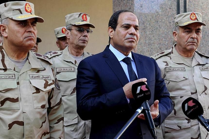 Egyptian President Abdel Fattah al-Sisi has signed off on an anti-terrorism law that gives authorities more sweeping powers to ban groups on charges ranging from harming national unity to disrupting public order. -- PHOTO: REUTERS