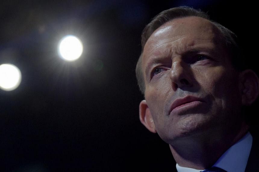 Australian Prime Minister Tony Abbott says he feels he is at the "height of his powers" as a new poll shows him gaining on the opposition, despite reports that conservative colleagues may still move to dump him. -- PHOTO: EPA