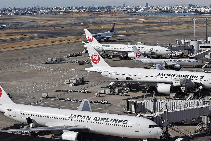 Japan appears set to relax rules to let pilots fly until they are 67 as it tries to ease a shortage created by the growing popularity of air travel, an official said Tuesday. -- PHOTO: AFP