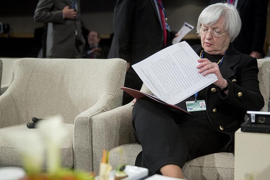 Janet Yellen, chair of the US Federal Reserve, attends an International Monetary Fund Committee (IMFC) governors meeting at the International Monetary Committee (IMF) and World Bank Group Annual Meetings in Washington, D.C., U.S., on Oct. 11, 2014. -
