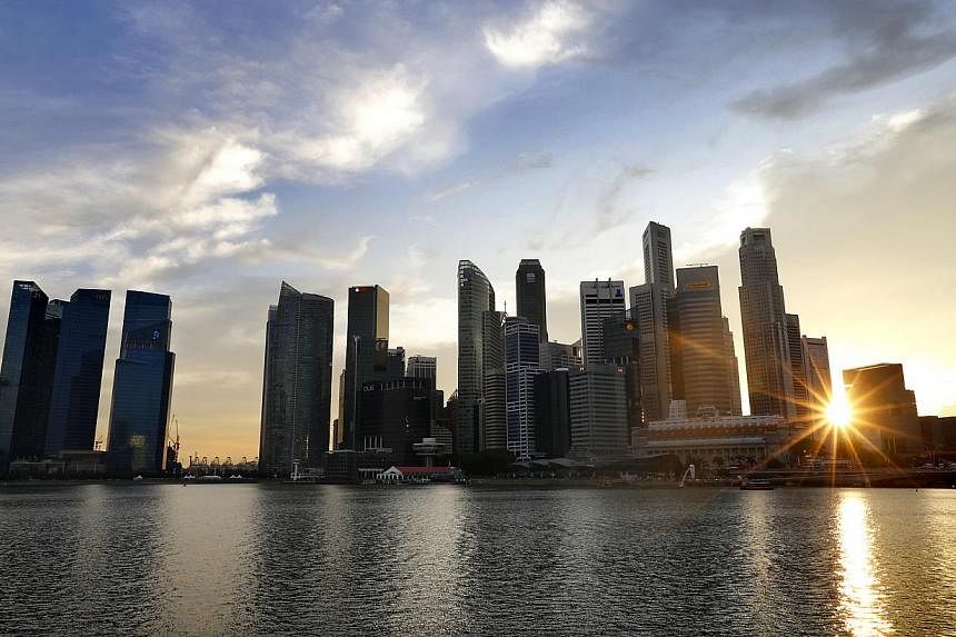 Singapore must develop a "pull through" strategy to pull its SMEs onto the world stage. SMEs employ 80 per cent of the workforce but contribute only 25 per cent to GDP. -- PHOTO: THE BUSINESS TIMES