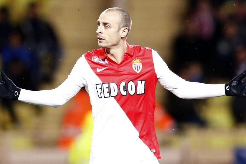 Dimitar Berbatov will be hoping for a goalscoring return against his former arch-enemies Arsenal when AS Monaco come to the red half of north London for their Champions League Round of 16 first leg match on Wednesday. -- PHOTO: AFP