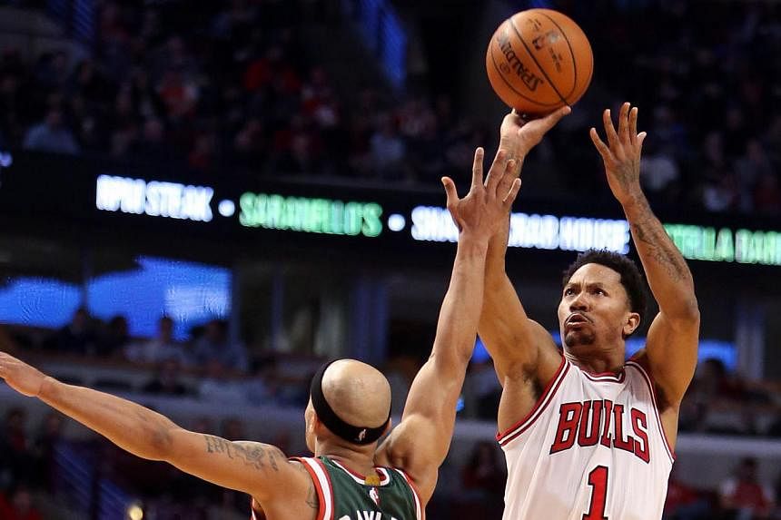 Former National Basketball Association MVP Derrick Rose (right), who has already undergone two knee operations, will undergo surgery to repair a torn meniscus on his right knee. -- PHOTO: CAYLOR ARNOLD-USA TODAY SPORTS/REUTERS&nbsp;