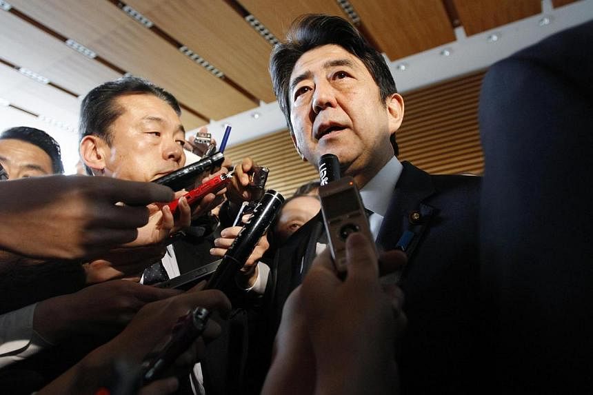 Historical revisionism propelled by a right-leaning Japan, led by its prime minister Shinzo Abe, is precipitating a "history war" in the 21st century. -- PHOTO: REUTERS&nbsp;