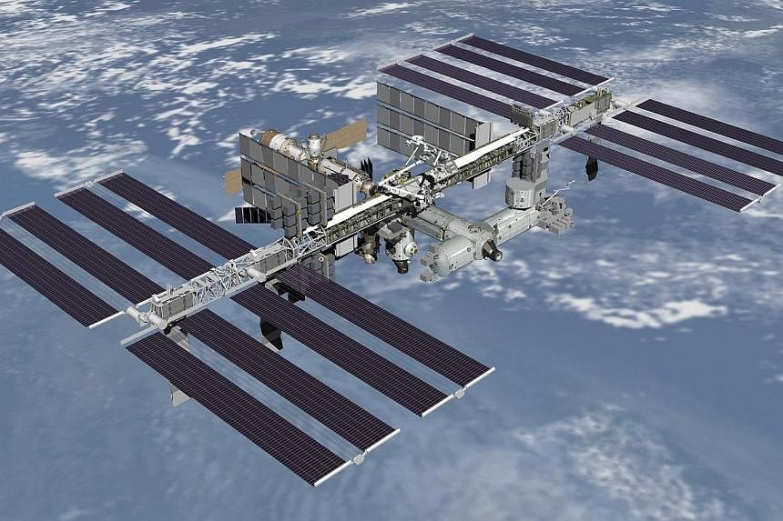 Russia will continue using the International Space Station along with NASA until 2024, its space agency said, after Moscow had threatened to stop financing it in 2020. -- PHOTO: REUTERS