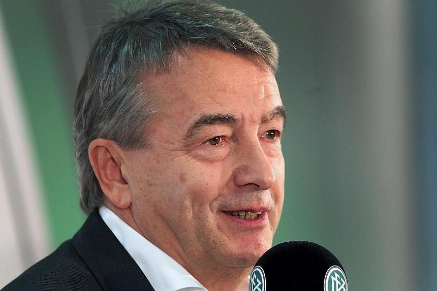 Mr Wolfgang Niersbach, President of the German Football Federation (DFB), addresses the media during a news conference in Frankfurt am Main, western Germany, on Dec 16, 2014. -- PHOTO: AFP