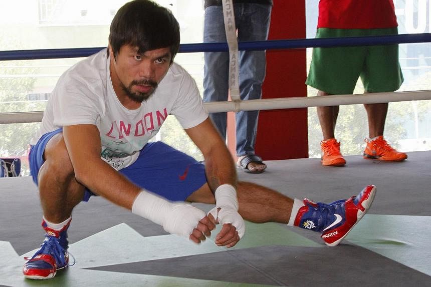 Philippine boxing icon Manny Pacquaio attends a training session at a gym in General Santos City on the southern island of Mindanao on Feb 21, 2015. Pacquiao said he has a simple tactic to beat American favourite Floyd Mayweather in history's richest
