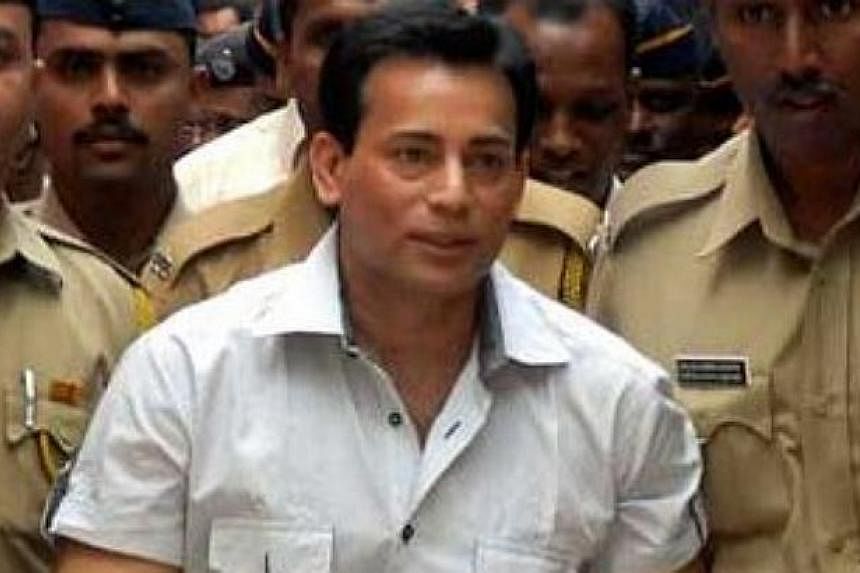 A Mumbai court on Wednesday, Feb 25, 2015, sentenced Abu Salem, once one of India's most feared gangsters, to life in prison for the murder of a builder two decades ago. -- PHOTO: THE STATESMAN/ASIA NEWS NETWORK